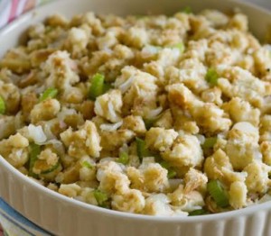 Woman holding bowl of stuffing